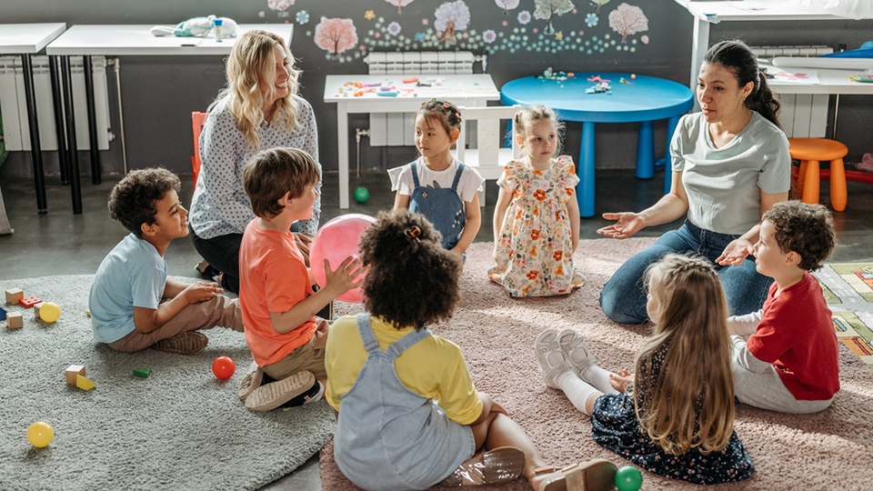 Teacher with students